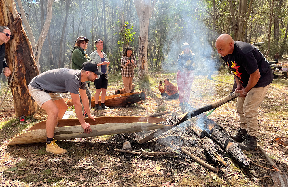 Shane Herrington and Aidan Hartshorn, canoe making workshop with Buugang Elective students on Wolgalu Country, 2024