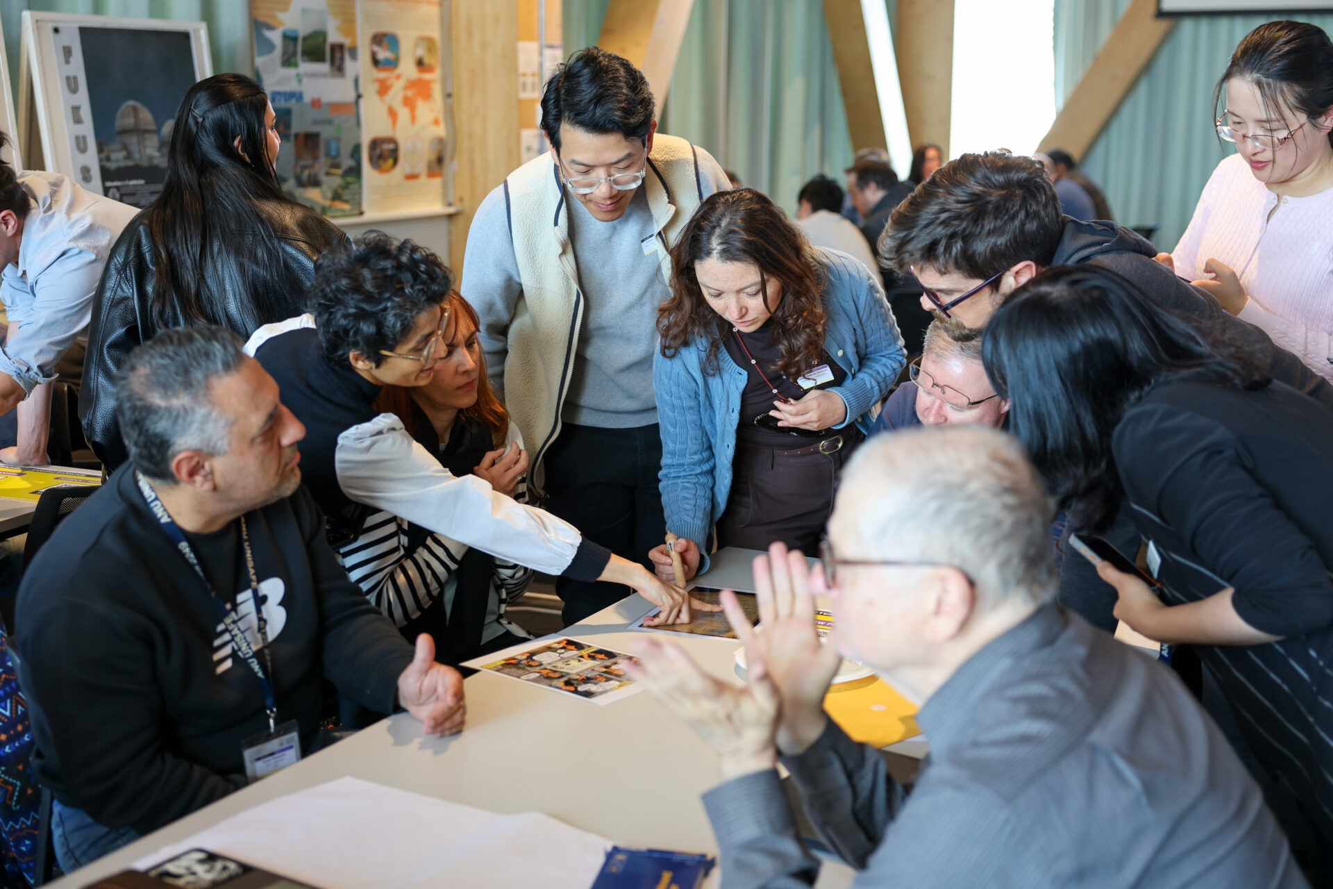 Participants collaborate on a table-based activity.